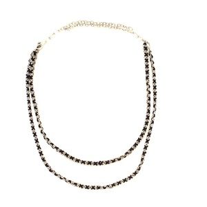 Long black and silver dressy necklace.